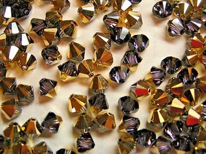 Rare Vintage Swarovski® Bicone Beads #5328 - 6mm - CRYSTAL AURUM - 360 Pieces - Picture 1 of 3