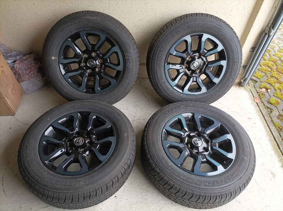 Neue Toyota Hilux Sommerräder Bridgestone 265/60R18 110H nur 10Km DOT23 - Bild 1 von 4