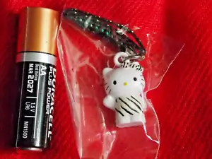 ⭐ ¡SELLADO! MINI FIGURA DE MASCOTA HELLO KITTY CEBRA 2,5 cm SANRIO REINO UNIDO 🙂 - Imagen 1 de 3