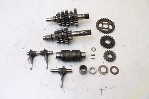 Suzuki DR350 1993 OEM 24120-14D03 eje de transmisión engranajes horquillas de cambio tambor - Imagen 1 de 7