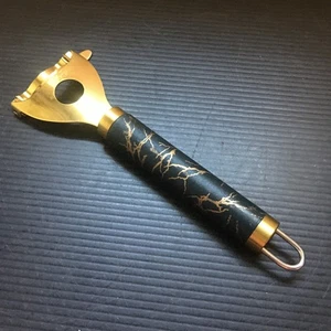 Strumento spogliarellista nocciolo mais acciaio inox tono oro vintage con appendere a parete - Foto 1 di 5