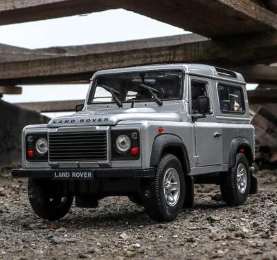 Coche modelo de metal fundido a presión Welly 1:24 Land Rover Defender nuevo en caja Foto 1 de 4