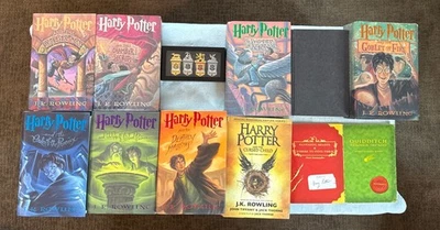 7 FIRST EDITIONS!! The entire Harry Potter Book Set. Plus house bookmarks. - Image 1 of 4