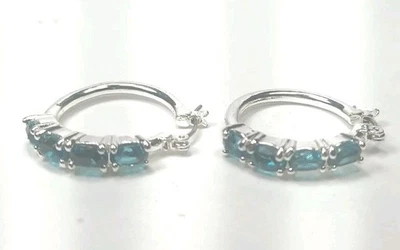 Pendientes de aro de cumpleaños Avon, diciembre, topacio azul Foto 1 de 3