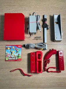 Nintendo Wii rossa - WII ed mario + 1 GIOCO - 100% funzionante+ 2 wiimote - Foto 1 di 2