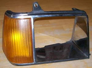1981-1985 FORD ESCORT HEADLIGHT BEZEL (RH) - Picture 1 of 8