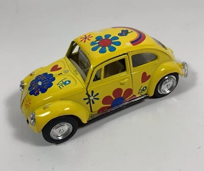 Volkswagen Classical Beetle 1967 modelo de coche amarillo escala 1:32 de Kinsmart Foto 1 de 4