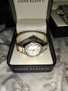 Anne Klein NY Women's Rhinestone Accented White Ceramic Stainless Steel Watch - Picture 1 of 11