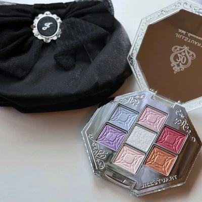 Paleta de sombras de ojos compacta Jill Stuart 20 aniversario color joya, juego de bolsa Foto 1 de 4