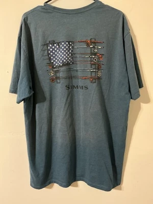 Simms tee shirt, size XL, blue with fishing reels / flag - Image 1 of 3