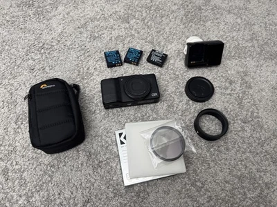 Cámara digital compacta Ricoh GR II (GR2) 16,2 MP APS-C negra y 3 baterías y estuche Foto 1 de 4