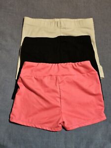 4 Pairs Of girls cartwheel shorts, Size 6... Pink, Black, White, Sparkling Black