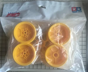 Tamiya RC 4-PACK Wheel Set in Yellow for Lunch Box or Midnight Pumpkin # 9335036 - Picture 1 of 2