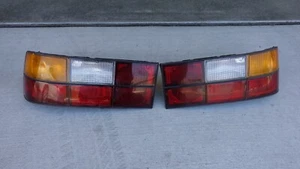 🥇84-86 PORSCHE 944 SET OF 2 REAR LEFT & RIGHT TAIL LIGHT LAMP OEM - Picture 1 of 9