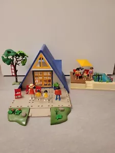 Playmobil: 3230 Ferienhaus + 5575 Swimmingpool mit Zubehör und Figuren - Bild 1 von 14