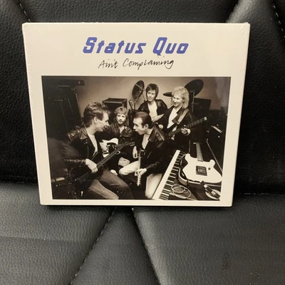STATUS QUO Ain't Complaining 3CD deluxe SEALED. Shrinkwrap Tear. Please Read….. - Image 1 of 4