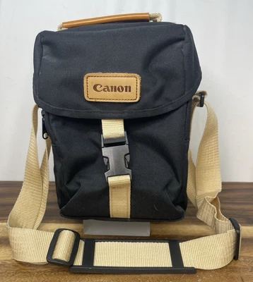 Bolso de hombro para cámara Canon de lona negra y tostada con correa ajustable Foto 1 de 4