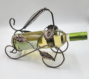 Porte-bouteille de vin unique en métal torsadé affichage fleurs et feuilles