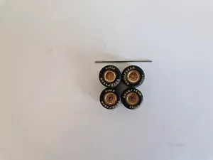 Minichamps 1/43 F1 Wheels - Goodyear Yellow (Bronze met. rims, Ferrari) (x1 set) - Picture 1 of 4