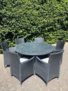 Royalcraft Black Rattan Garden Set Glass Circular Table Six matching Chairs