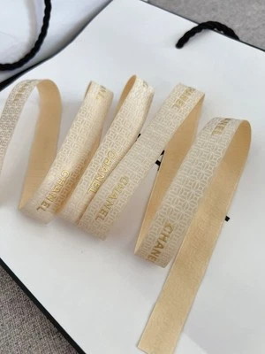 Authentic Chanel Holiday Woven Ribbon With Gold Glitter And White Logo - Image 1 of 4