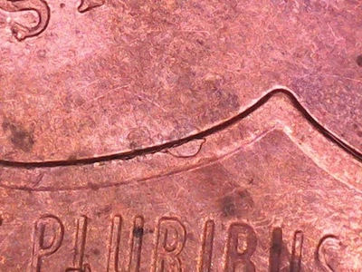 2015 P Penny with Nice Die Chip Error on Reverse Top of Shield - Image 1 of 4
