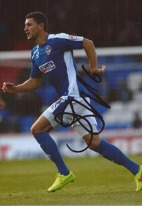 OLDHAM: JAMES WILSON SIGNED 6x4 ACTION PHOTO + COA - Bild 1 von 1