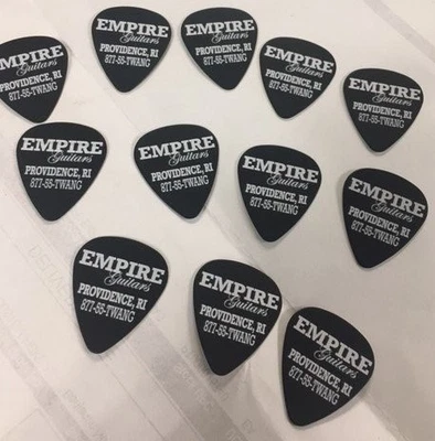 Paquete de 12 púas de guitarra Empire Guitars Foto 1 de 2