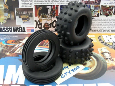 Team Associated 6007 RC10 Classic 40th Front 6313 Ribbed & Rear 6314 Spike Tires - Image 1 of 4
