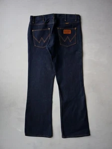 Jeans de mezclilla oscuros vintage años 90 Wrangler Cowboy Bootcut hechos en EE. UU. 33x31 - Imagen 1 de 7