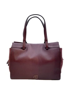 Bolso de Mano Cole Haan de Cuero Burdeos Unisex Liso Duradero - Imagen 1 de 8