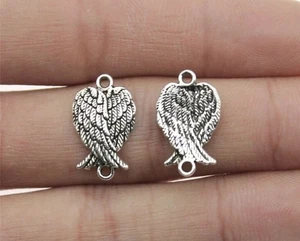 Lot de 5 breloques / Connecteurs  ailes d'ange en métal argenté, 1.9 x 1.1... - Picture 1 of 1
