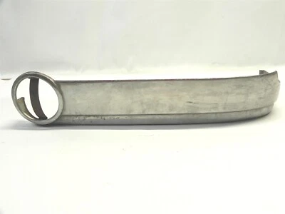 VINTAGE 1954-56 CADILLAC ELDORADO DRIVER SEAT LOWER TRIM PIECE W/EMBLEM BRACKET  - Image 1 of 4