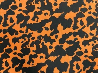 Tela de vestir de gasa con estampado de vaca naranja 150 cm de ancho Foto 1 de 2