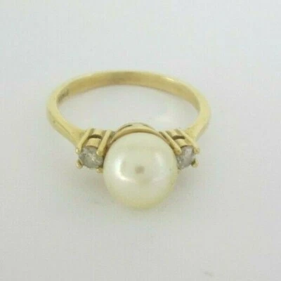 ANILLO SEÑORA ORO AMARILLO 14K PERLAS Y DIAMANTES (TALLA 6) .03TDW. 2.6G Foto 1 de 4