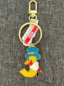 Disney Parks 2024 Buchstabe J für Jiminy Cricket Figur Metall Schlüsselanhänger Pinocchio - Bild 1 von 4