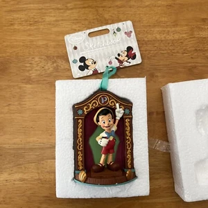 Disney Store Pinocho Cuaderno de Bocetos Adorno 2014 Pinocho En Escenario Navidad - Imagen 1 de 3