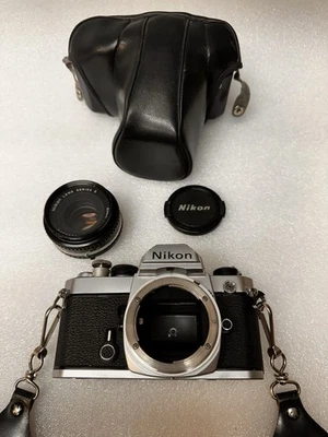 Nikon Silver FM 35mm SLR Film Camera 50mm Series E Lens & Cap, Strap, Case Japan - Image 1 of 4