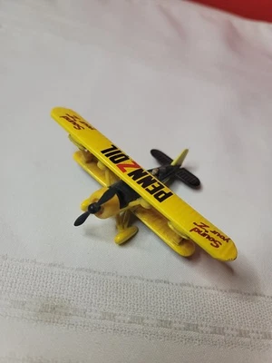 Caja de cambios Diecast Pennzoil Biplane - 4 pulgadas de ancho - Sin caja Foto 1 de 4
