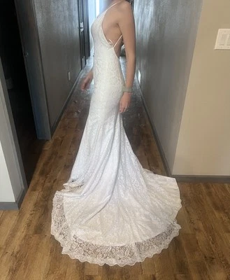 Precioso vestido de novia estilo sirena de encaje. Talla 4, nunca usada Foto 1 de 4