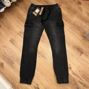 Pantalones de mezclilla Crosshatch Malinore cargo puño para hombre 32W 32L gris lavado - Imagen 1 de 11