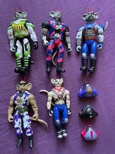 6 Figurines BIKER MICE Galoob 1994 Sand Slammin Modo 3 casques - Imagen 1 de 5