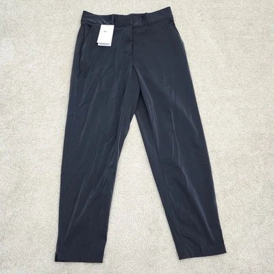 Pantalones de golf Nike Dri-FIT Tour medianos negros FD5607-010 para mujer Foto 1 de 4