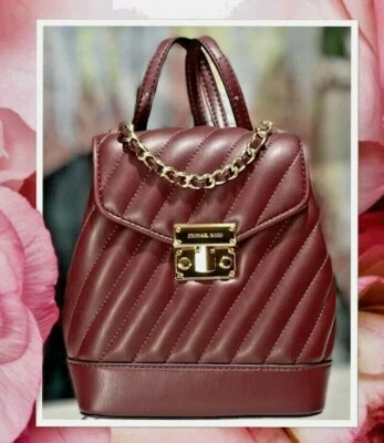 NWT MICHAEL KORS ROSE XS Conv. Backpack Crossbody Bag In MERLOT Vegan Leather   - Image 1 of 4