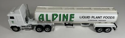 Remolque cisterna Ertl 1/64 diecast Mack semirremolque para plantas líquidas alpinas Foto 1 de 4