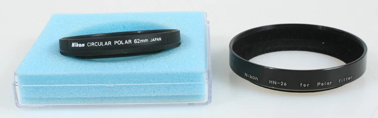 NIKON 62MM POLARIZER W/ HN-26 LENS HOOD I.O.B. - Image 1 of 1