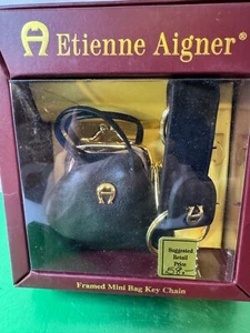 Llavero mini bolso con marco Etienne Aigner ~ negro ~ nuevo en la caja - Imagen 1 de 6