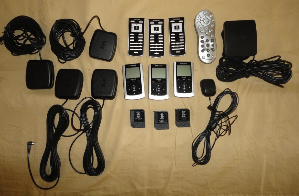LOT 16 Sirius XM Radio / 9 Receivers + 1 Remote + 6 Antennae / Samsung Helix - Image 1 of 4