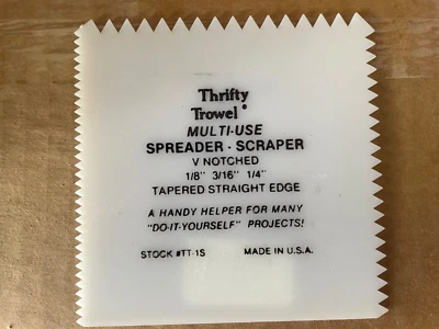 Caja de 36 unidades - Raspador esparcidor Thrifty con muescas en V y borde recto Foto 1 de 3