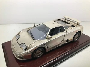 BBURAGO 3055 BUGATTI EB110 1991 -SILVER PLATED 1:18- POOR ON WOODEN STAND - Picture 1 of 8